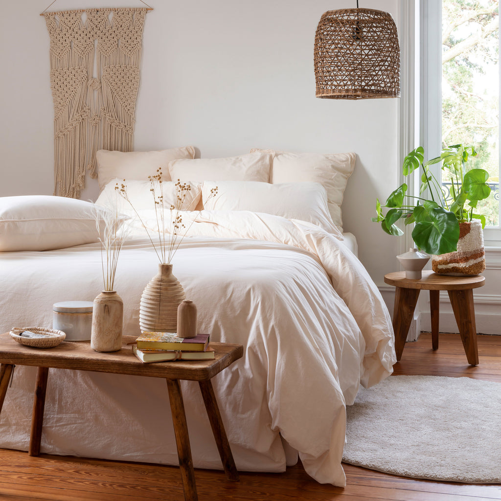 A Bed Featuring the Carré Blanc Souffle Collection